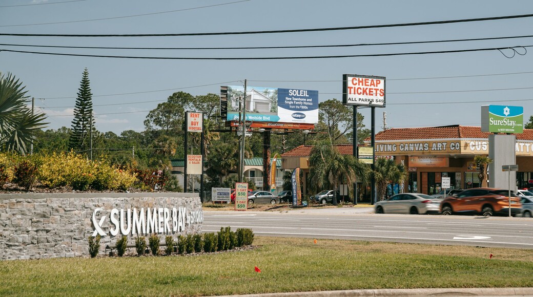 Four Corners which includes signage and a small town or village