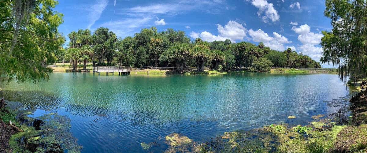 Blue green lake at Gemini Springs State Park just north of Orlando in Debary, Florida