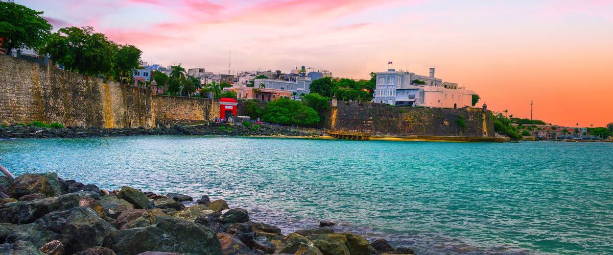Old San Juan, or Viejo San Juan, at Puerta de San Juan Gate Harbor built in 1635 in Bajo Tablazo Sandbank, a view from the Garita del paseo del morro under Castillo San Felipe del Morro Fort