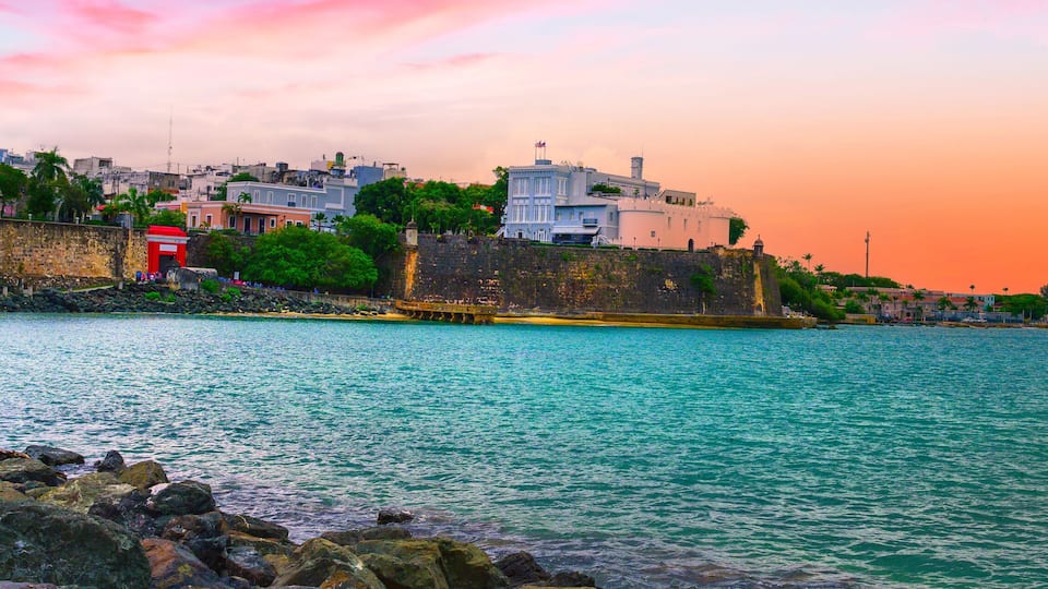 Old San Juan, or Viejo San Juan, at Puerta de San Juan Gate Harbor built in 1635 in Bajo Tablazo Sandbank, a view from the Garita del paseo del morro under Castillo San Felipe del Morro Fort