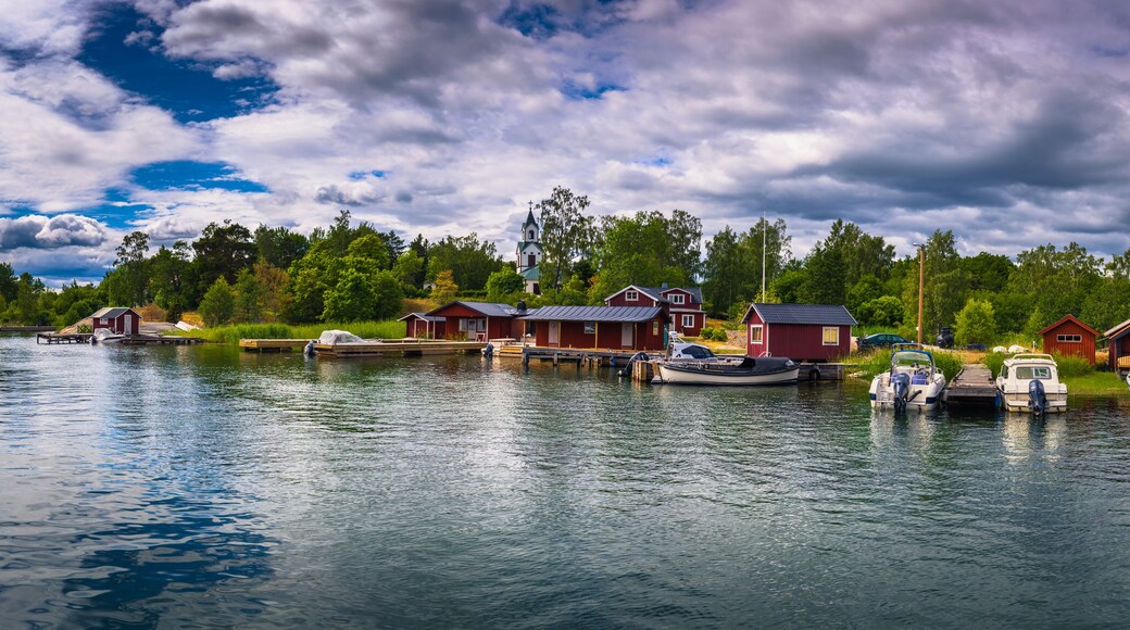 Swedish Archipelago - June 23, 2018: Panoramic view of a small coastal town in the island of Moja in the Swedish Archipelago during Midsummer, Sweden