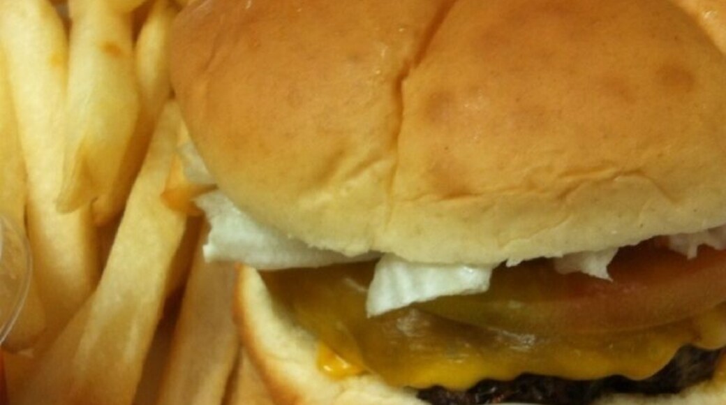 Hamburger with Mild Cheddar Cheese 8oz of pure flavor in a Finest Kaiser Roll... not to forget the French Fries!!! Yummy Yummy Yum!!