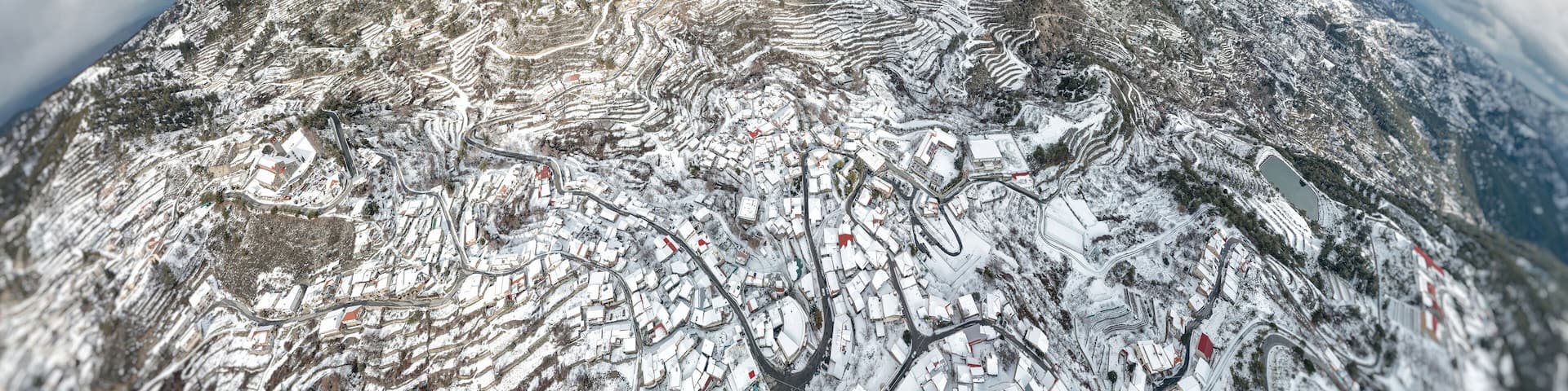 Kyperounta village covered by winter snow. Limassol District, Cyprus