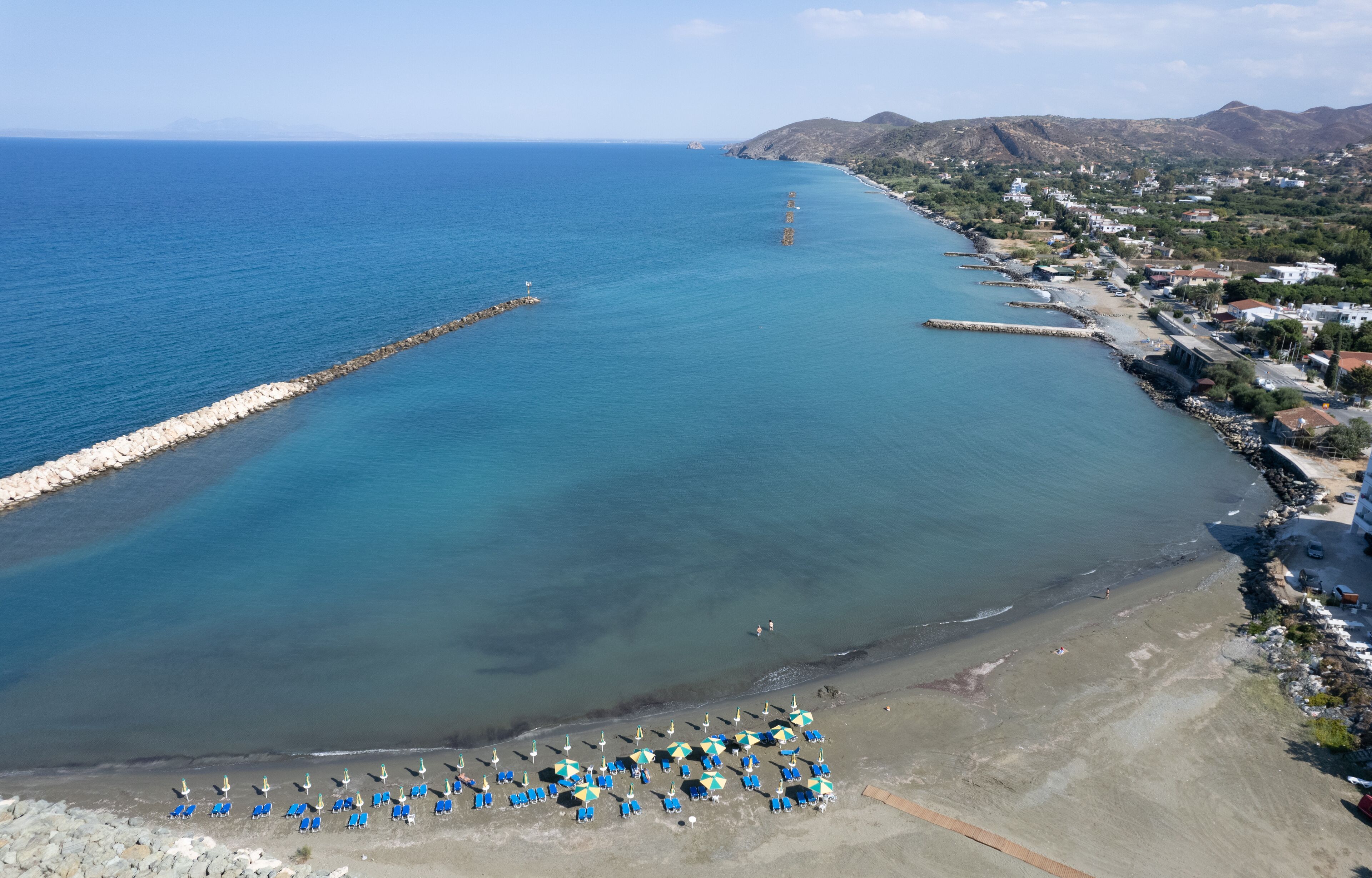 Aerial view, drone photograph of the coastline of Pano Pyrgos village in Cyprus
