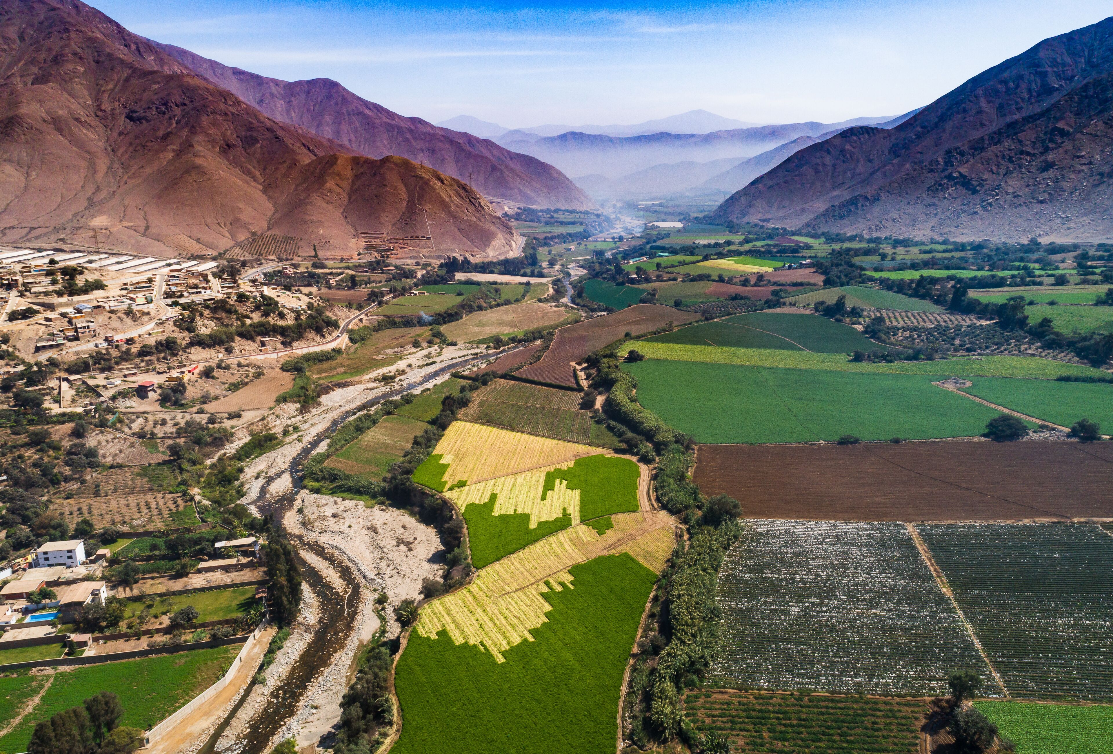 Aerial drone view of crop fields at Chillon valley near Lima, Peru.