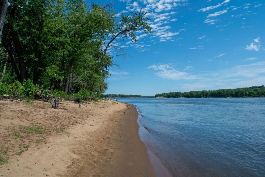 South view of a Mississippi River sandbar on the Wisconsin shoreline during the summer