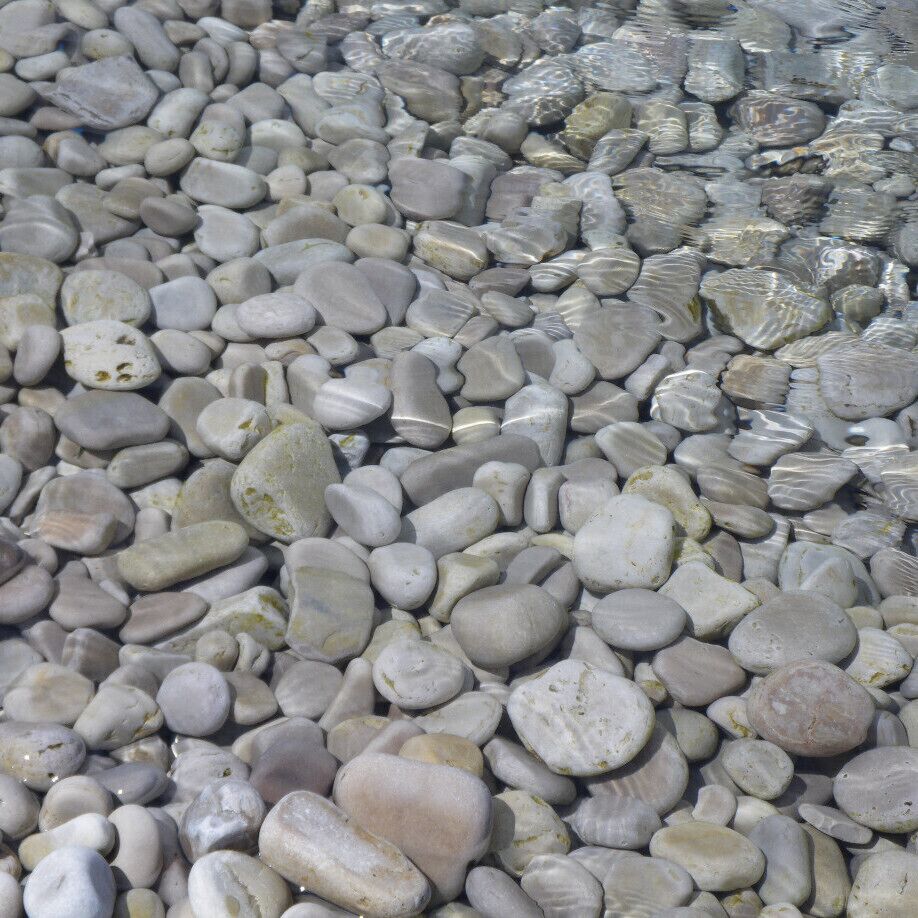 No sand on this beach . . just smooth limestone pebbles. Swim in chilly, clear Lake Michigan or, like me, just marvel at the rocky beach.