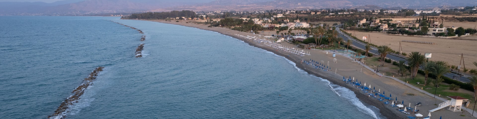 Aerial view, drone photograph of the coastline of Pano Pyrgos village in Cyprus