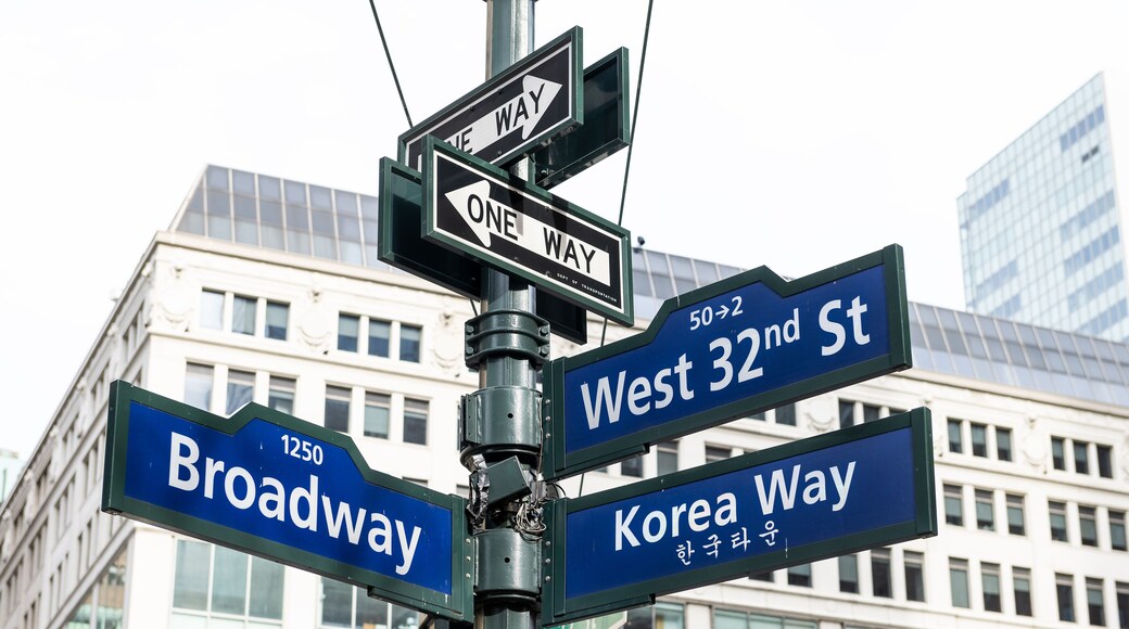 Manhattan NYC buildings of midtown near Korean Town, Korea Way road signs on west 32nd street, Broadway in New York City