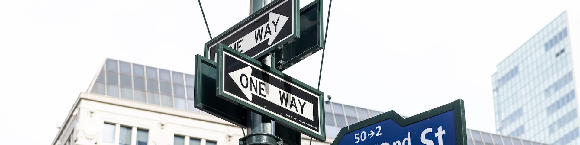 Manhattan NYC buildings of midtown near Korean Town, Korea Way road signs on west 32nd street, Broadway in New York City