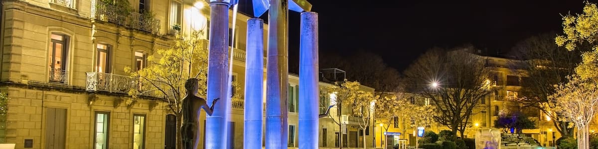 Place d'Assas square in Nimes at night - France