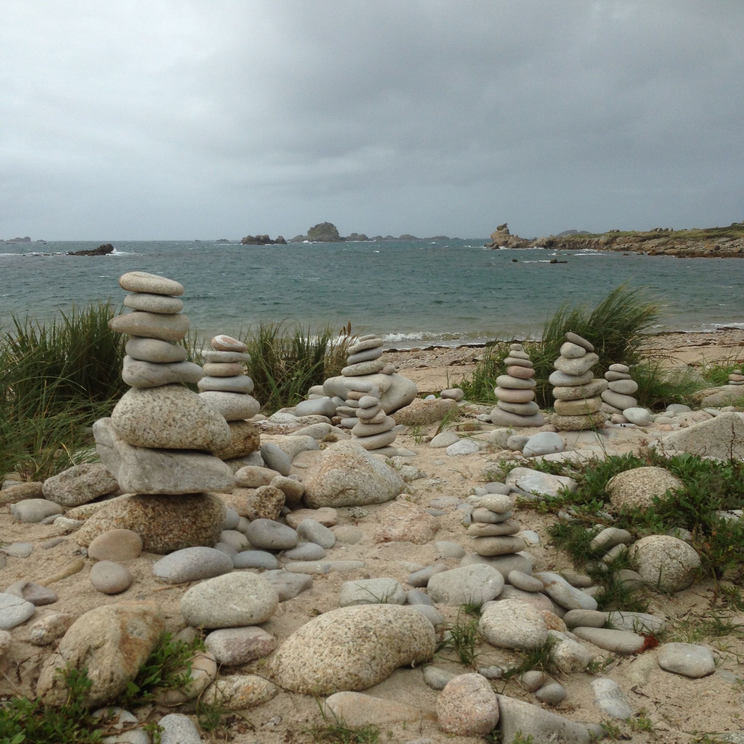This beach on Bryher, Isles of Scilly, is dotted with many stone quoits built by visitors over the years. Build your own while here but leave the others untouched. Many seals frequent the waters here. 