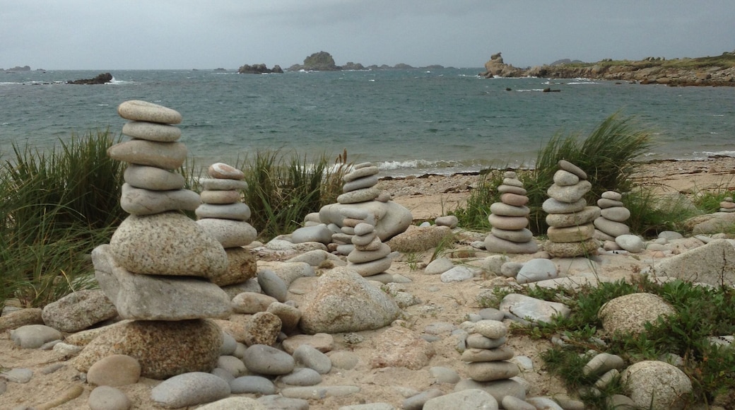 This beach on Bryher, Isles of Scilly, is dotted with many stone quoits built by visitors over the years. Build your own while here but leave the others untouched. Many seals frequent the waters here.