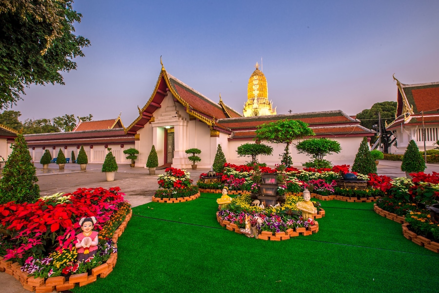Background of religious tourist attractions,the old Buddha Church (Phra Buddha Chinaraj National Museum)with both Thai and foreign tourists coming to make merit always in Thailand