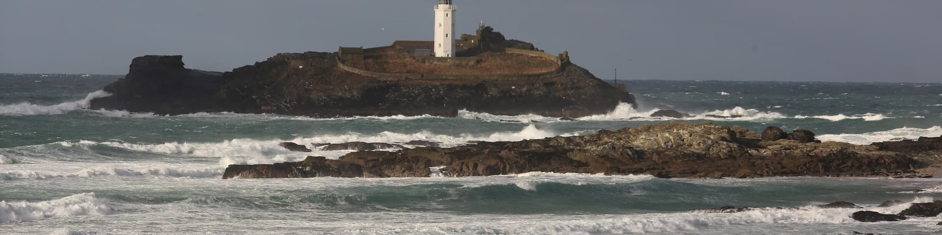 This Gwithan Lighthouse its about a mile off the coast. There is a National Trust area which gives great views of the coast line and long beach