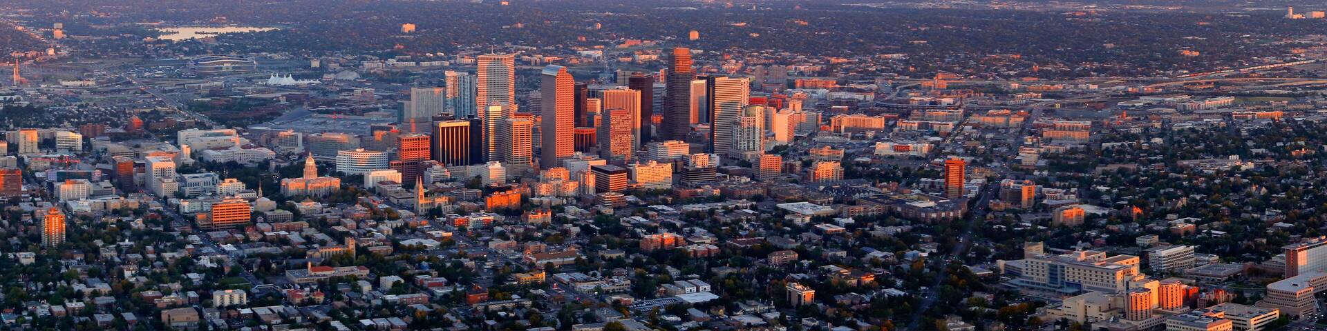 Sunrise on Denver Panorama. This is a 6 image stitched Panorama of the downtown Denver Colorado area at sunrise.