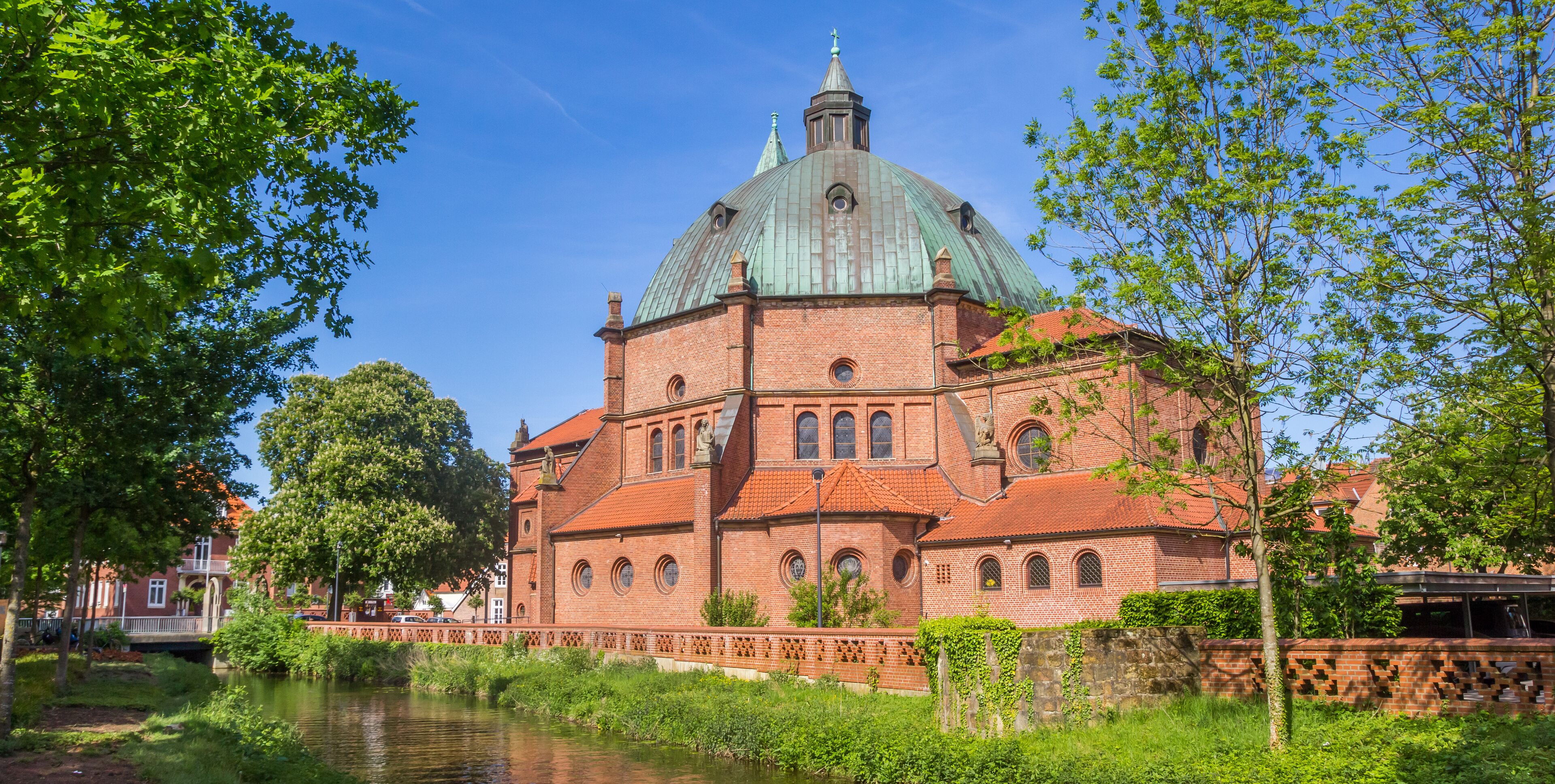 Panorama of the historic Augustinus church at the Vechte river in Nordhorn, Germany