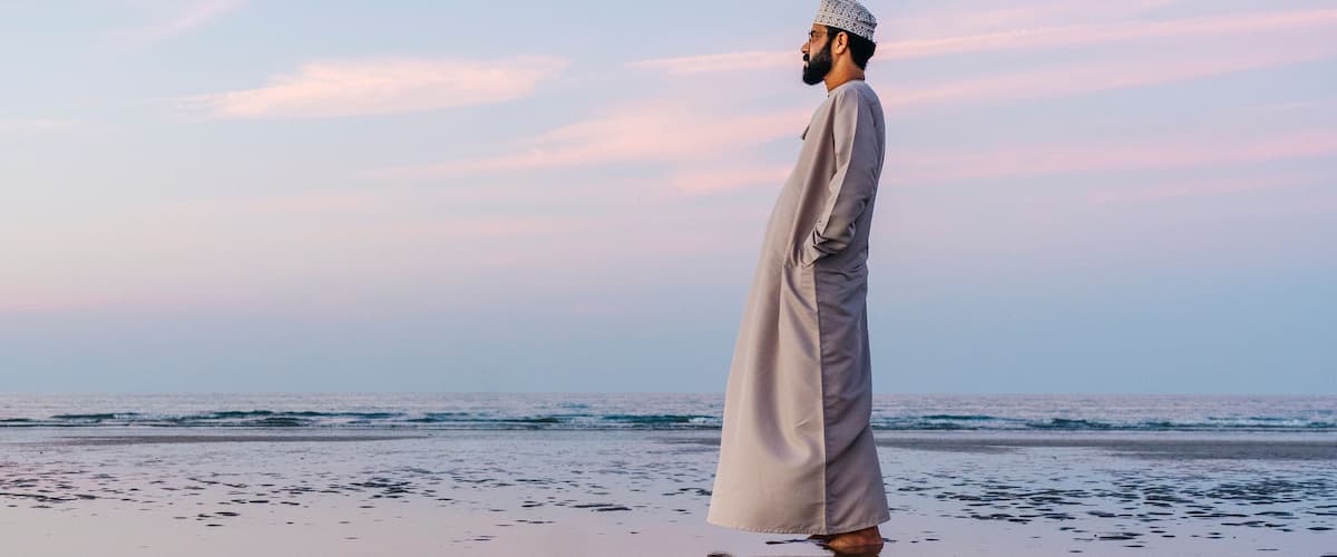 An Arab man on Azaiba beach in Muscat Oman