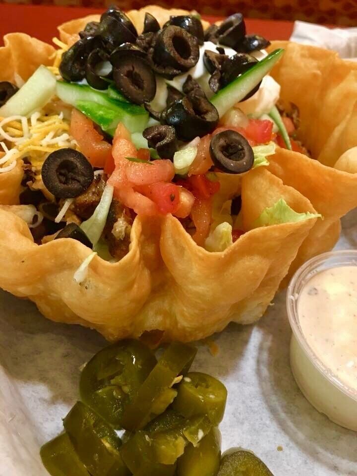 When craving for a light healthy lunch i go for salads at Moes... chopped lettuce, beans, shredded cheese, pico de gallo, cucumbers topped with black olives. #GoodEats photo contest