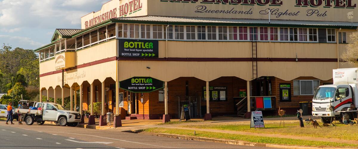 Ravenshoe which includes signage and a small town or village