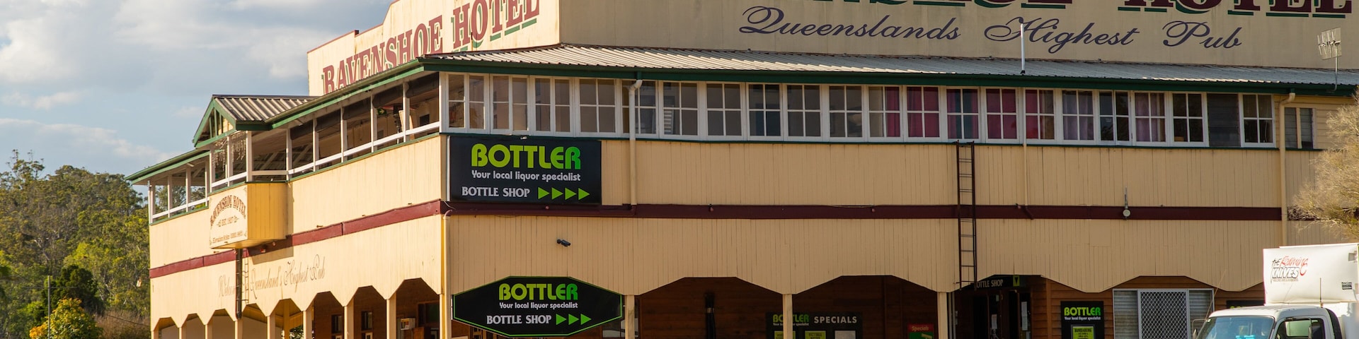 Ravenshoe which includes signage and a small town or village