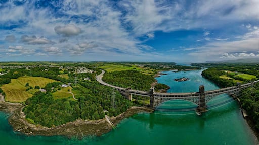 Menai Straits, Britannia Bridge and Nelsons statue, Anglesey, Wales, UK.