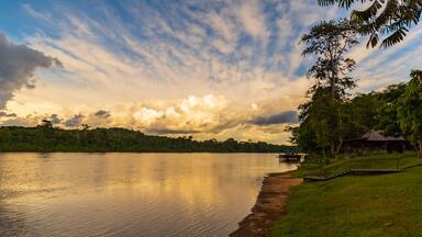 White Clouds With Blue Sky During Sunset In The Amazon.