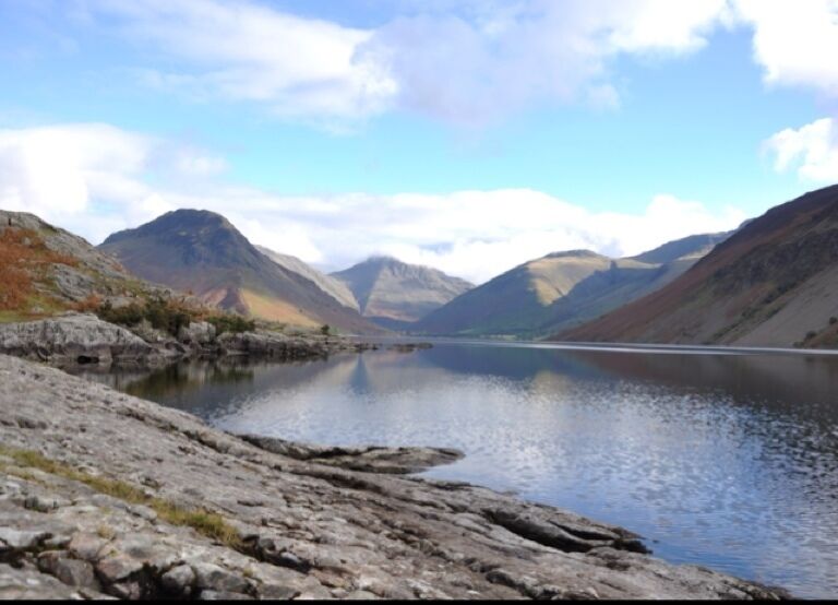 The view of Wastwater in the Lake District. It is England's deepest lake and is surrounded by mountains like Scafell Pike, England's highest mountain. 