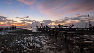 Sunrise Beach (Sunrise Beach) is beautiful in nature. Fisherman's way of life At Tha Sala Nakhon Si Thammarat, Thailand