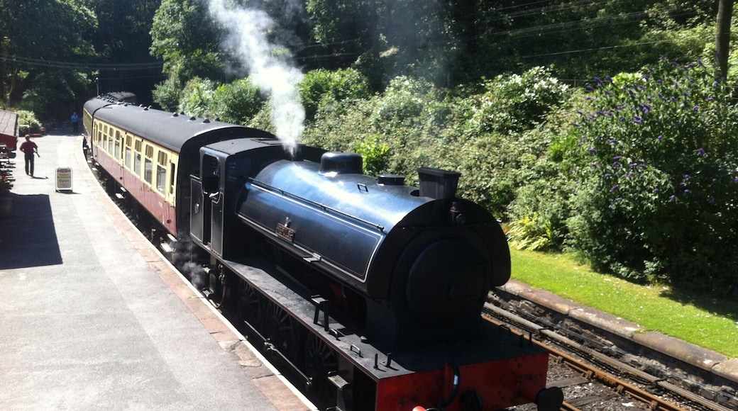 Steam train departing station