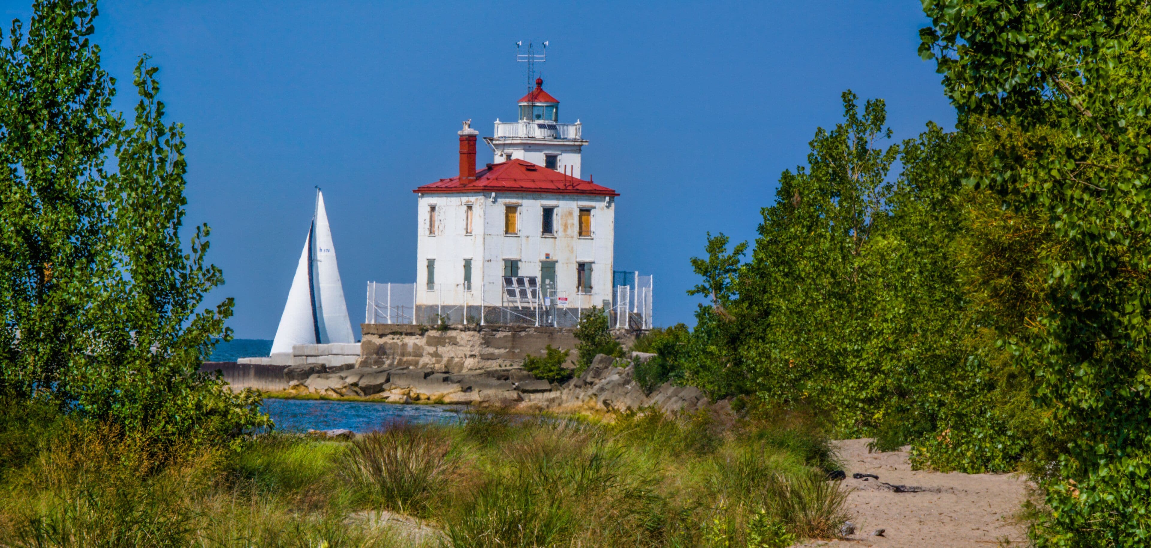 Fairport Harbor Light and Sailboat