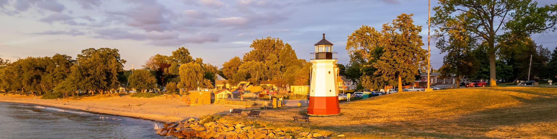 Historic Vermilion Lighthouse at harbor view state park in Vermilion city Ohio in twilight.