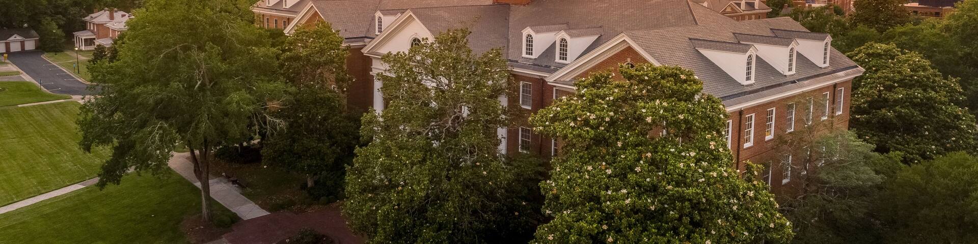 Aerial view of Virginia Hall, central building of Virginia State University public historically Black land-grant university in Ettrick with dramatic colorful sunset sky