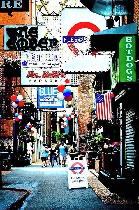 A small alley filled with blues clubs