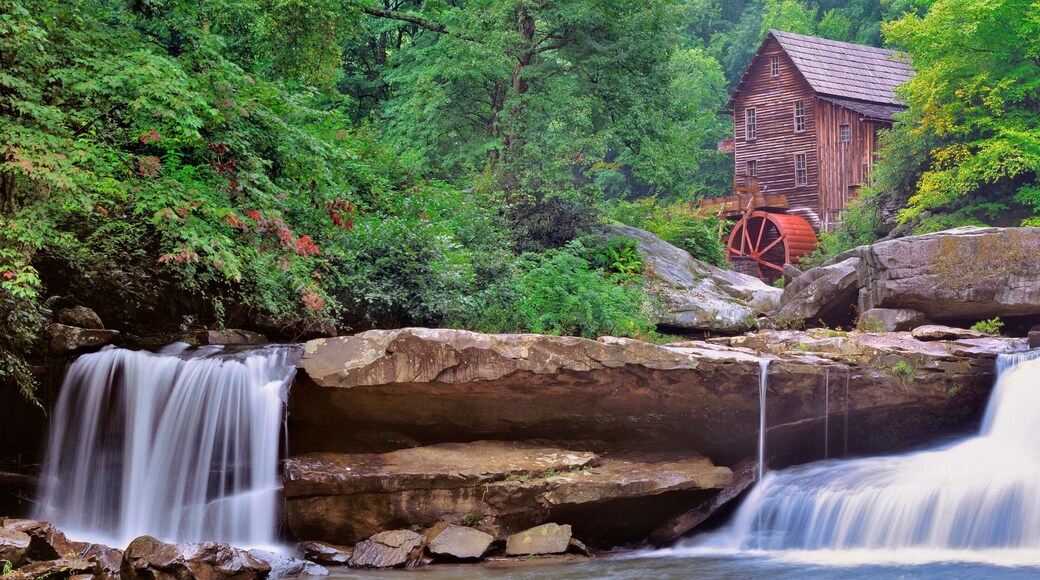 USA, West Virginia, Babcock SP. Two waterfalls form the foreground for Glade Creek Grist Mill, in Babcock State Park, West Virginia.