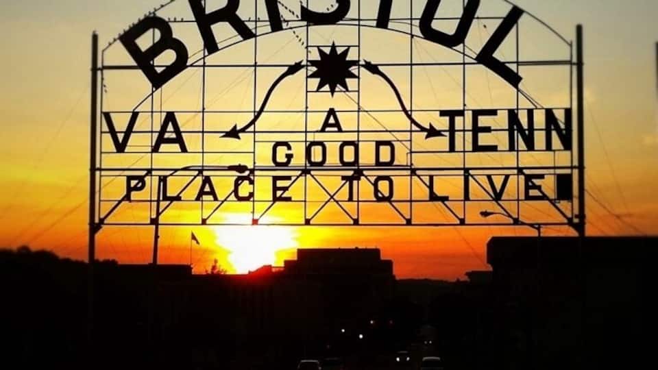 A sunset with a sign that reads "BRISTOL VA GOOD PLACE TO LIVE".