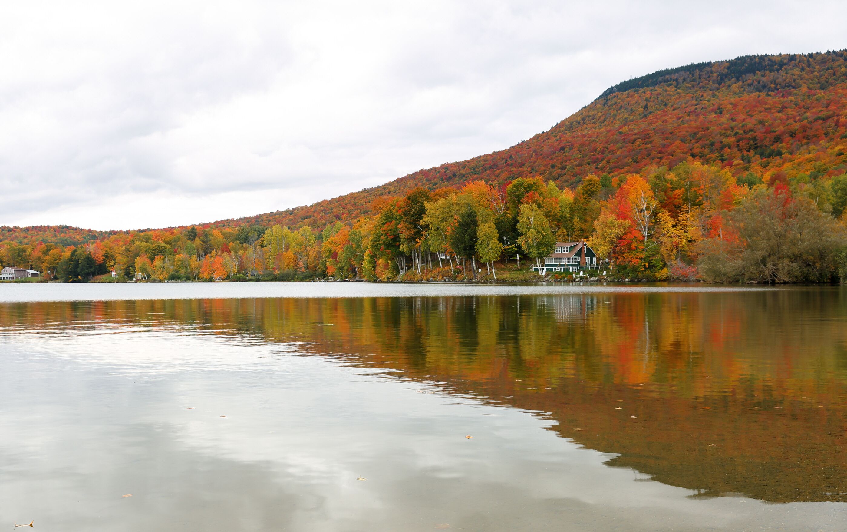 Overlooking of Lake Elmore State Part With Beautiful Autumn Foliage and Water reflections  at Elmore, Vermont, USA