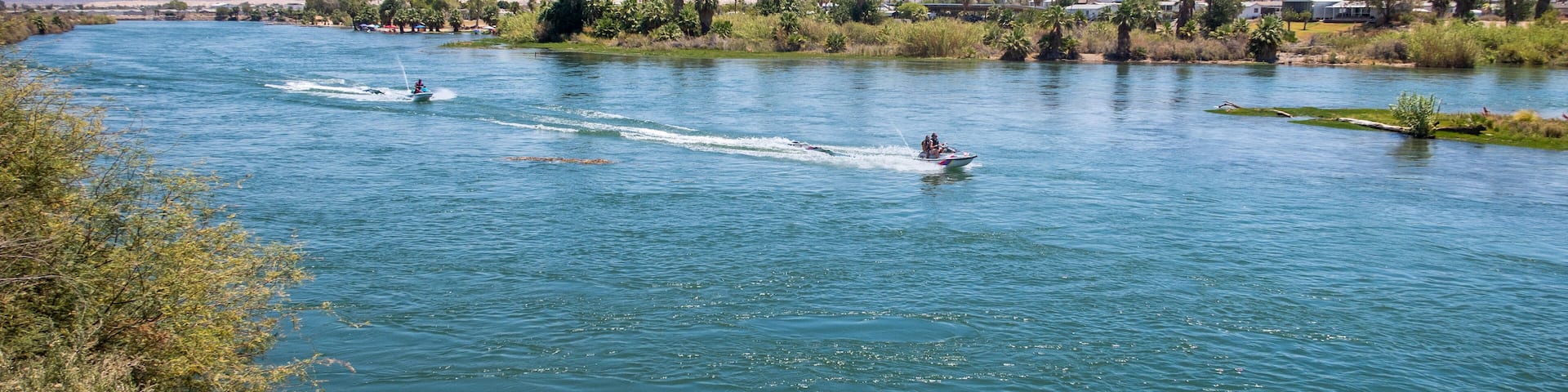 The Colorado River at Blythe, California, looking at the River from the West Bank and People Riding Jet Skis
