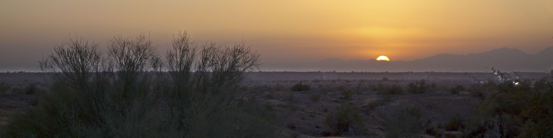 Desert sunset at Arizona and California border near city of Blythe