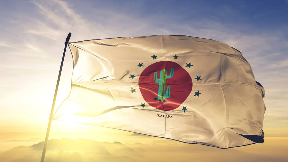 Zacapa department of Guatemala flag waving on the top sunrise mist fog