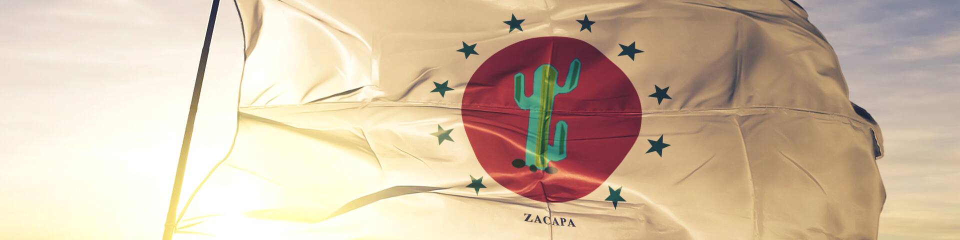 Zacapa department of Guatemala flag waving on the top sunrise mist fog