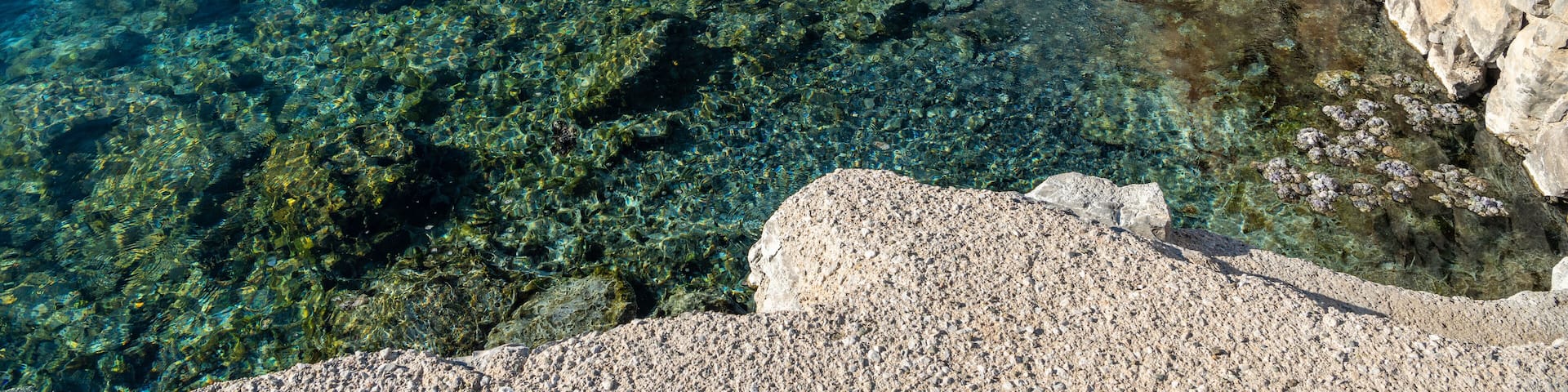 Pool of Kapukargin natural sulfur thermal bath near Dalaman town in Mugla, Turkey.