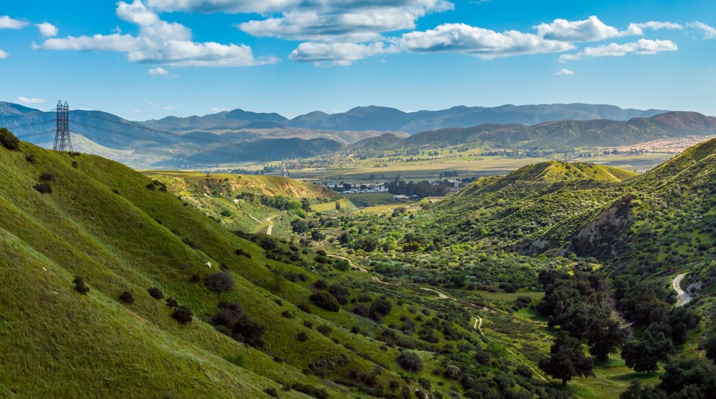 Rolling grass covered hills in banning below San Gorgonio Mountain