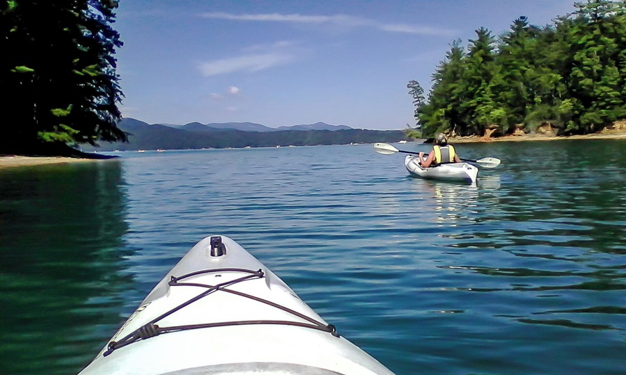Lake Jocassee is a 7,500-acre, 300-foot deep reservoir located in northwest South Carolina created by the state in partnership with Duke Power in 1973. The lake is commonly known for the clean and cold Appalachian mountain rivers that feed the lake to keep its waters cool and clear year-round. I love kayaking here surrounded by mountains and several water fall around the lake.