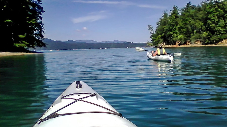 Lake Jocassee is a 7,500-acre, 300-foot deep reservoir located in northwest South Carolina created by the state in partnership with Duke Power in 1973. The lake is commonly known for the clean and cold Appalachian mountain rivers that feed the lake to keep its waters cool and clear year-round. I love kayaking here surrounded by mountains and several water fall around the lake.