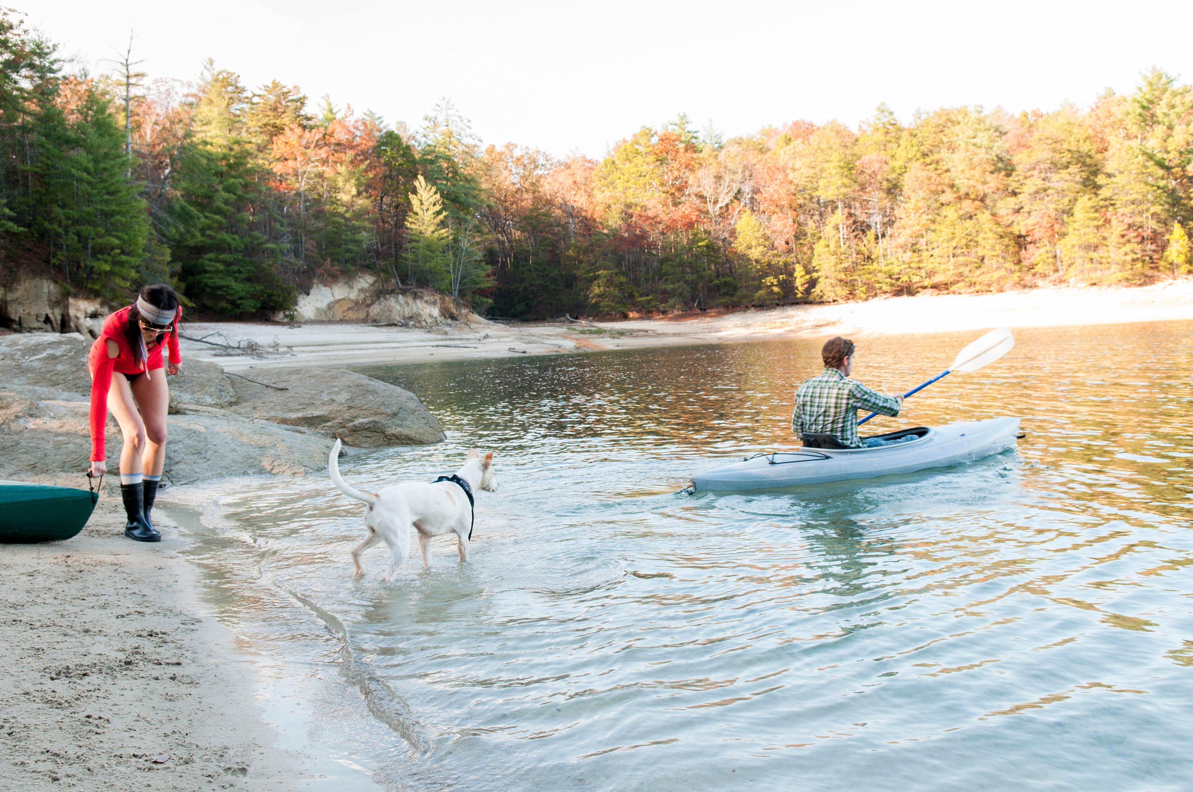 Couple kayaking in remote lake