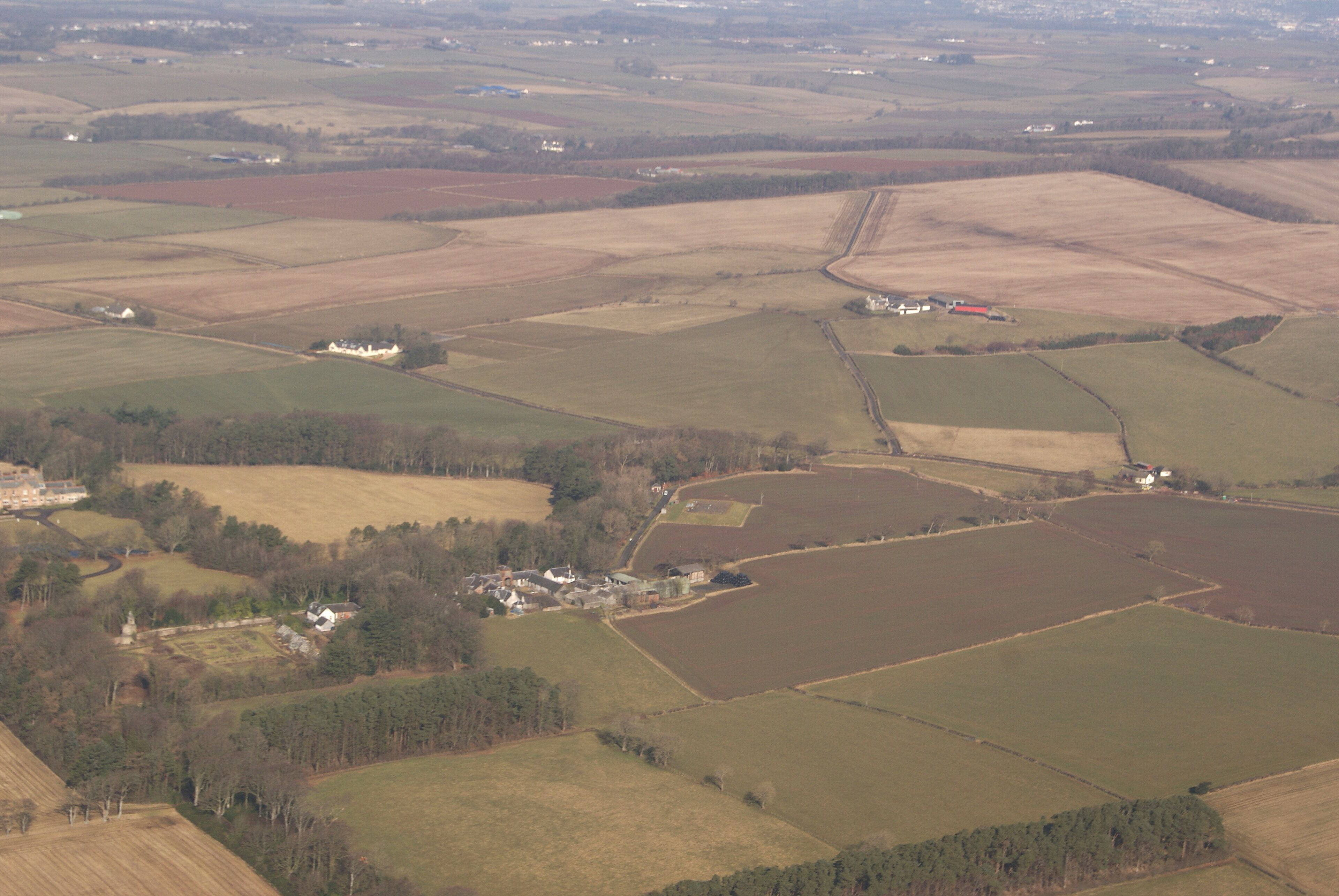 Ladykirk Viewed from a plane which has just taken off from Prestwick Airport.