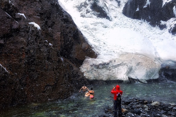 Skinny Dipping in freezing water by Franklin Falls #weekendgetaway #winterdestination #winter #snow #travel #adventure #nature #hiking #snowshoeing