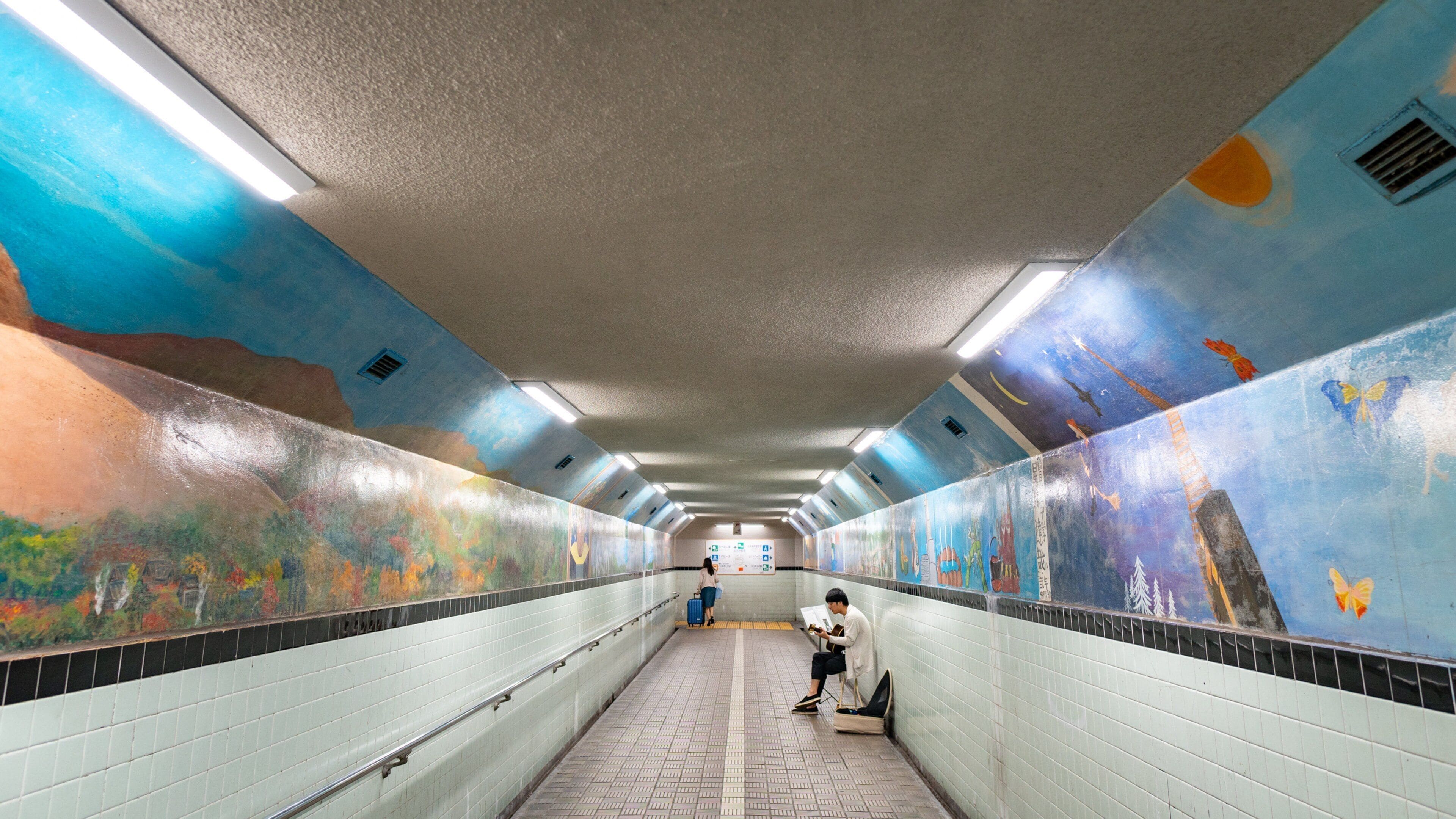 Beppu which includes interior views and outdoor art as well as an individual femail