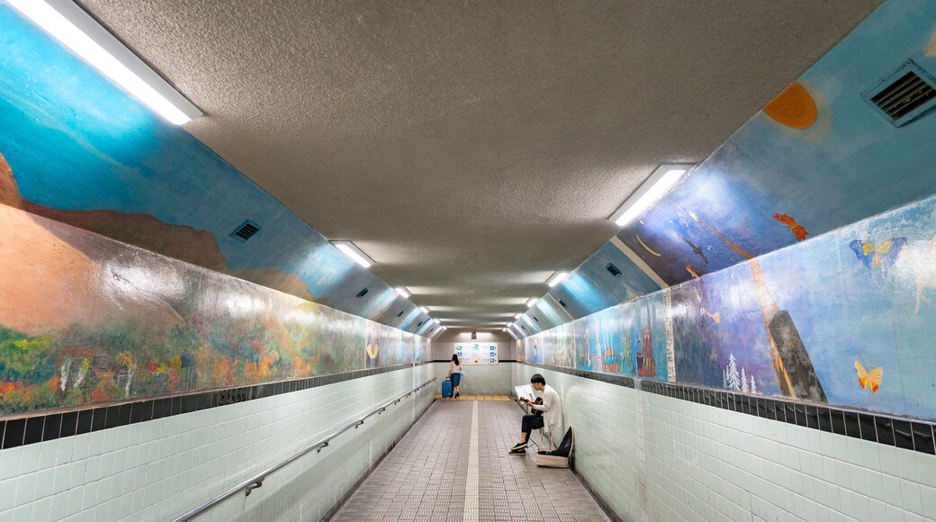 Beppu which includes interior views and outdoor art as well as an individual femail